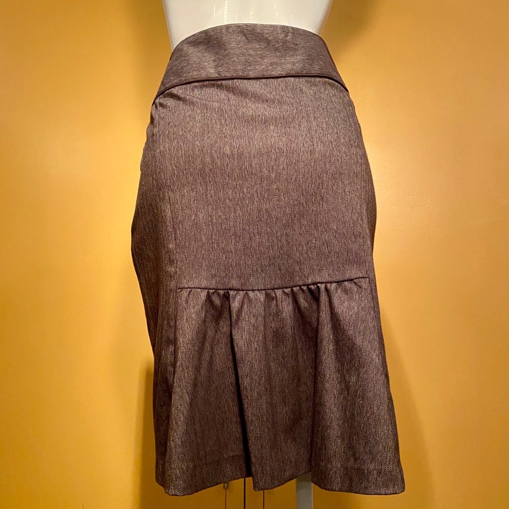 B.Wear midi pencil skirt with back ruffle. Size 9.